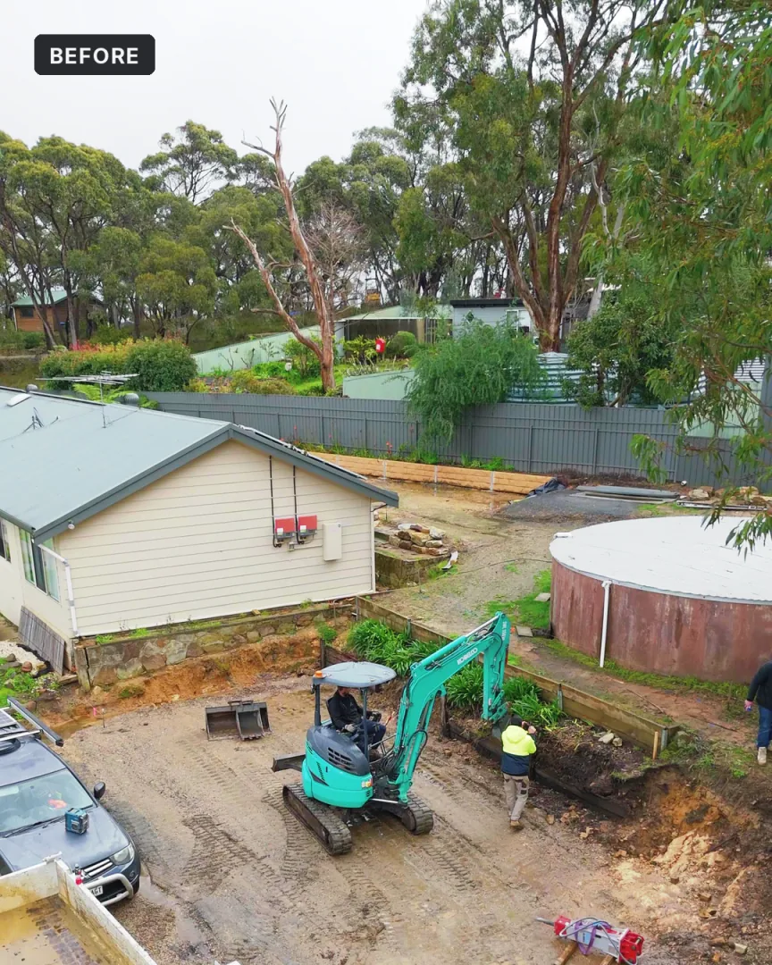 Heathfield block before the retaining wall, excavator on site